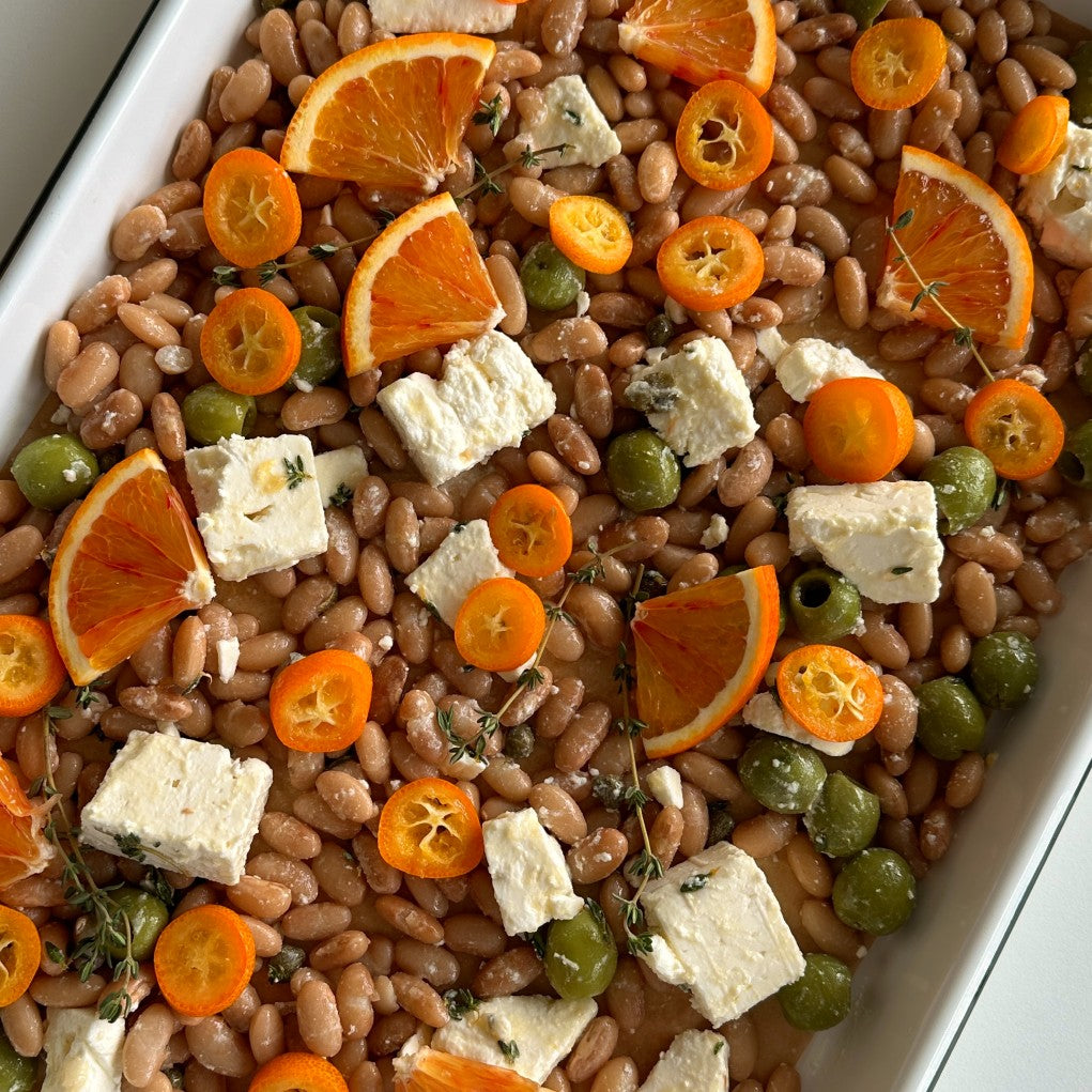 Sheet-pan beans with feta, citrus, and olives featuring Primary Beans Mayocoba beans