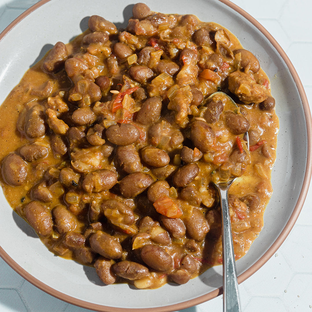 Kenyan kunde-inspired beans in a peanut-tomato sauce with Primary Beans