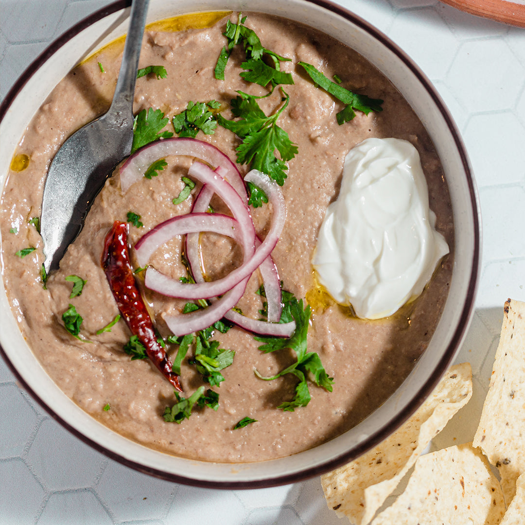 Mexican-inspired refried beans with pickled onions with Primary Beans