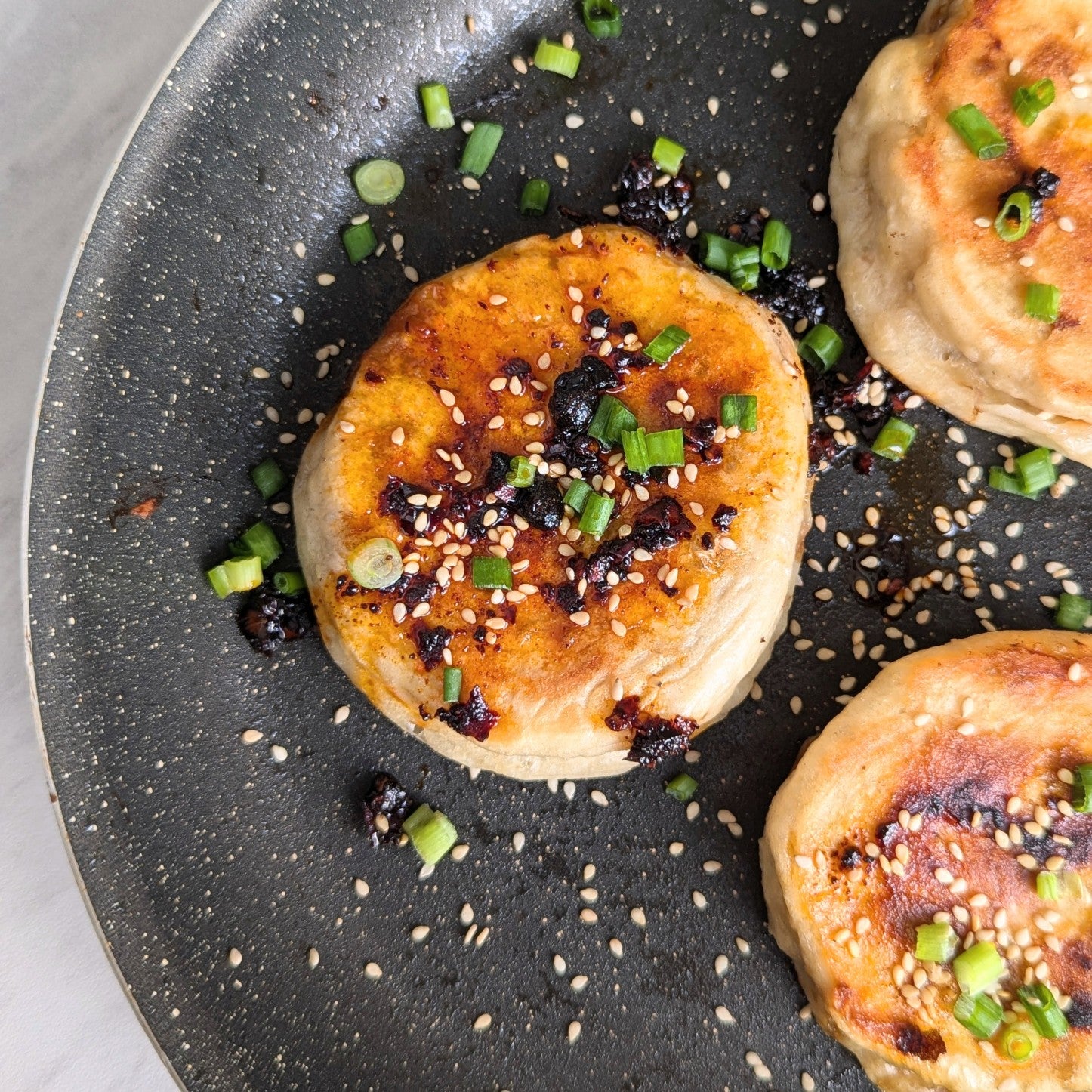 Chinese xian bing (pan-fried buns) with beans